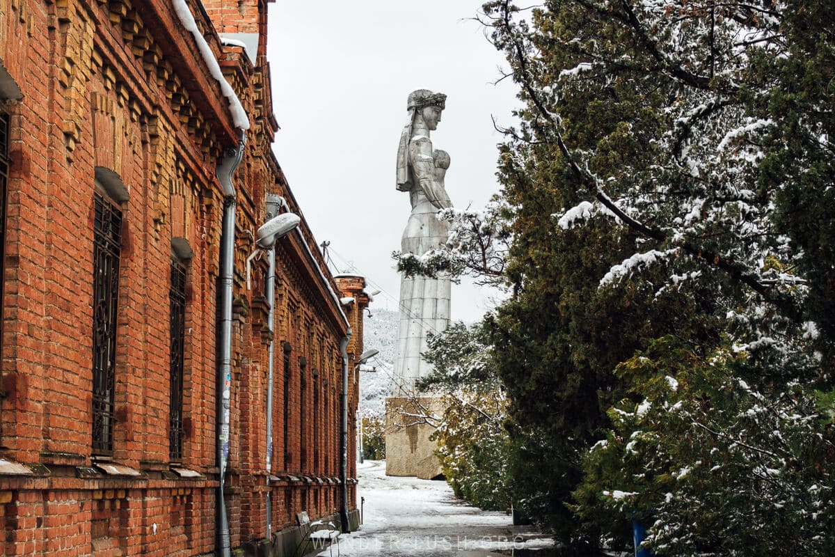 Mother of Georgia statue Kartlis Deda dusted with snow on a winter day in Tbilisi.